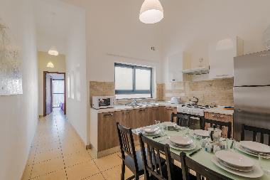Fully Equipped Kitchen / Dining.