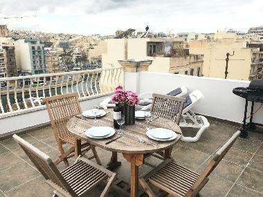 Terrace with BBQ and outdoor furniture