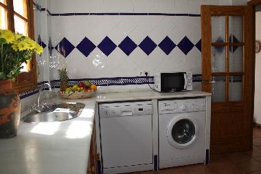 Fully equipped kitchen: Refrigerator, freezer, washing machine, dishwasher, microwave, coffee maker,